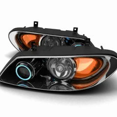 Paire de phares de voiture modernes avec anneaux lumineux bleus et réflecteurs orange. Idéal pour le remplacement phare prix.