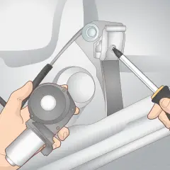 Maintenant, apprenons comment remonter manuellement une vitre électrique. Un tournevis est utilisé pour fixer le mécanisme.