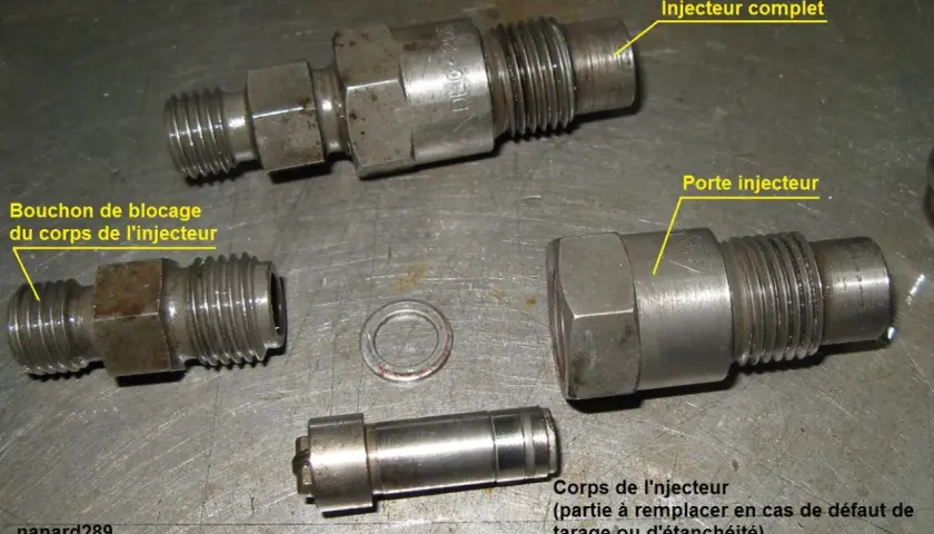 Pièces d'un injecteur essence : porte-injecteur, corps, bouchon et injecteur complet. Idéal pour tester ou remplacer.